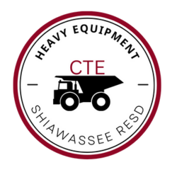 Circle with the words Heavy Equipment and Shiawassee RESD within it. There is an outline of a dump truck with CTE on top of the truck.